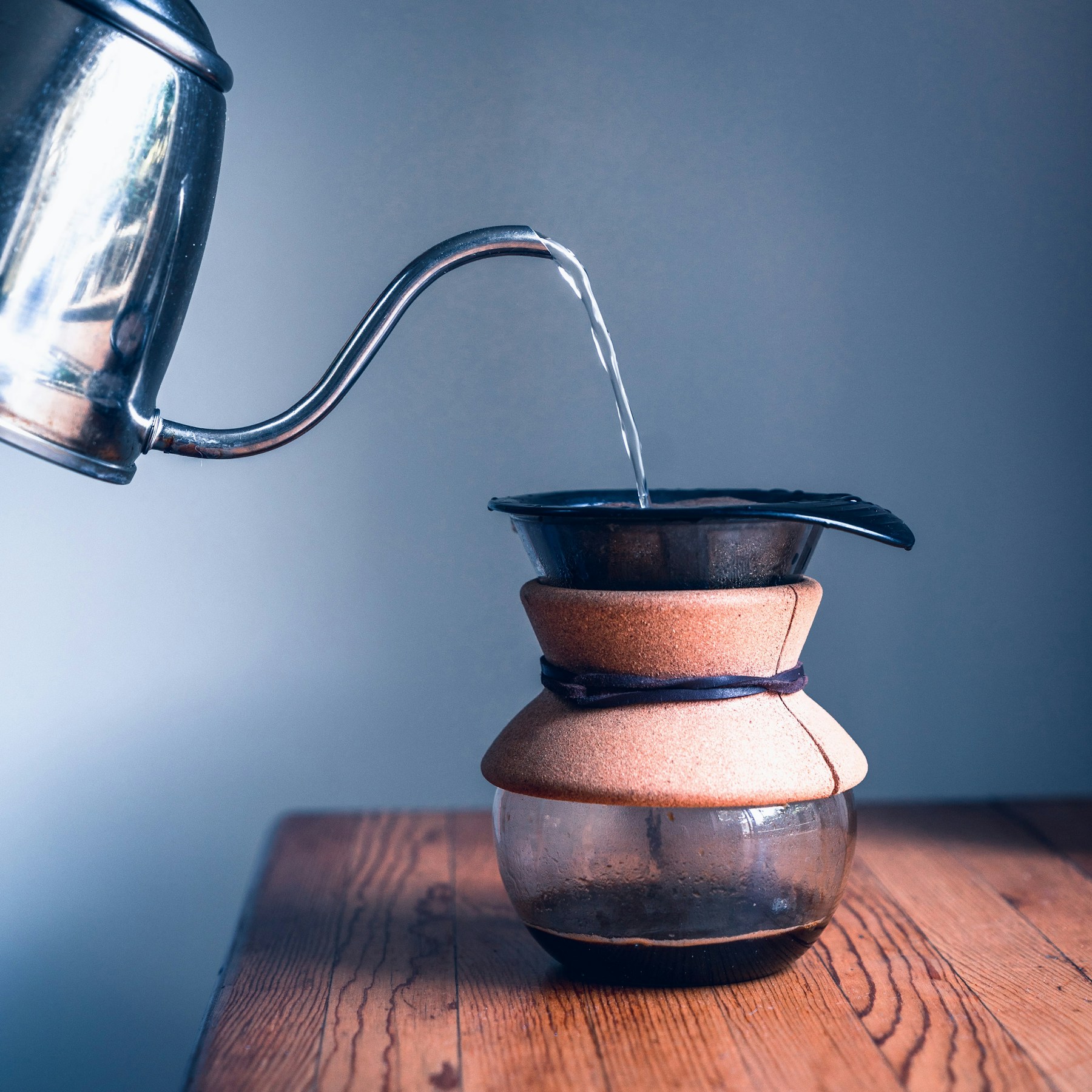 Coffee being brewed in a glass vessel
