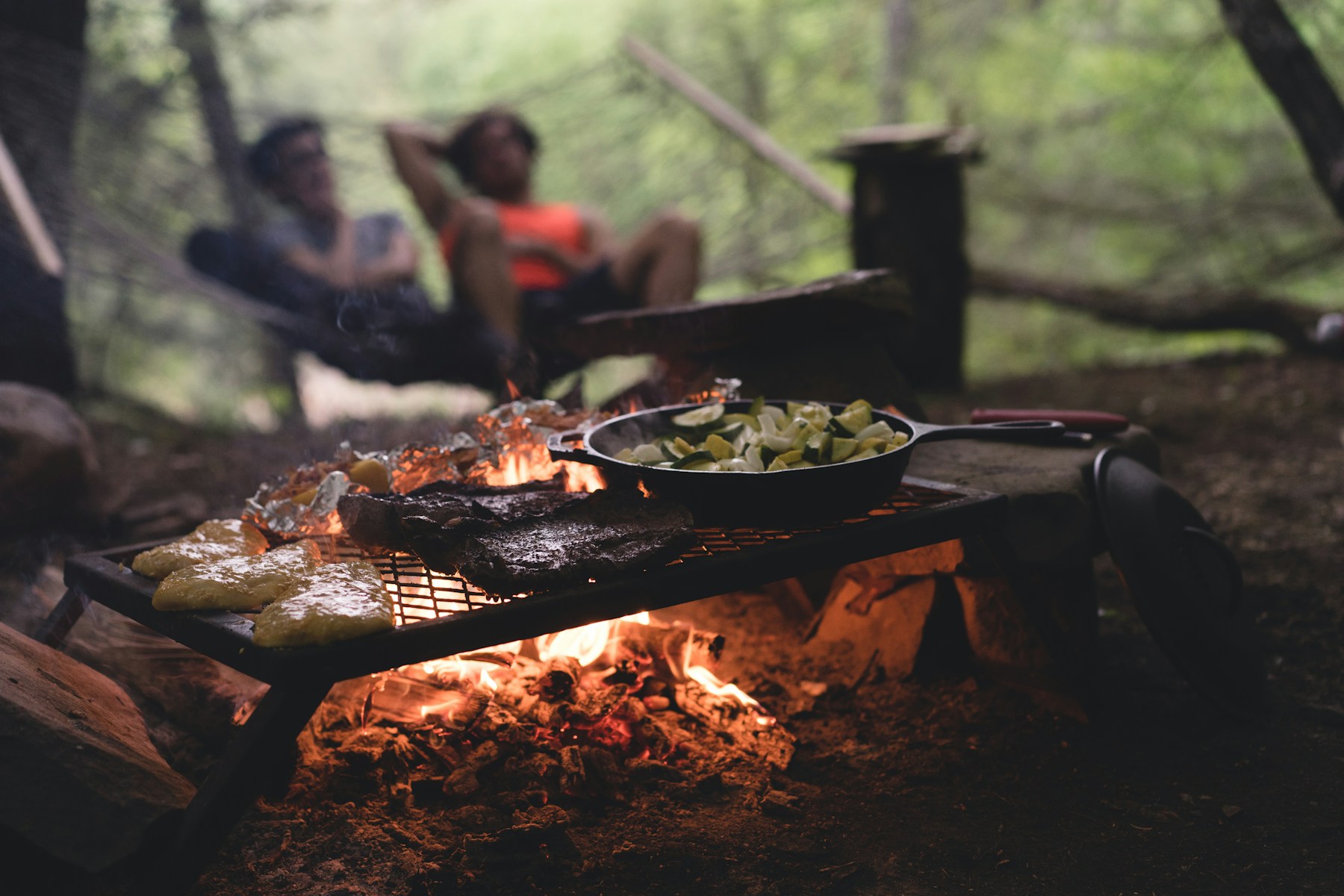 A quiet afternoon beside a cooking fire